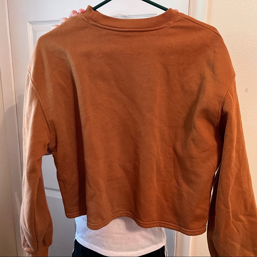 Worn once. Girls size M rust colored crop sweatshirt. EUC dress up or down.